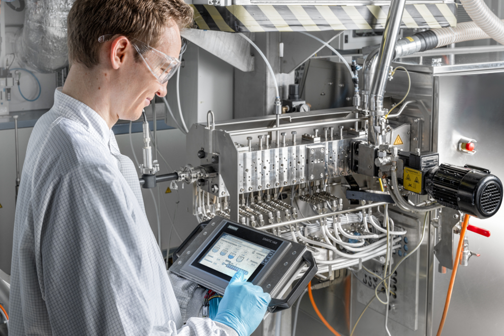 Simon Otte at work on a production line